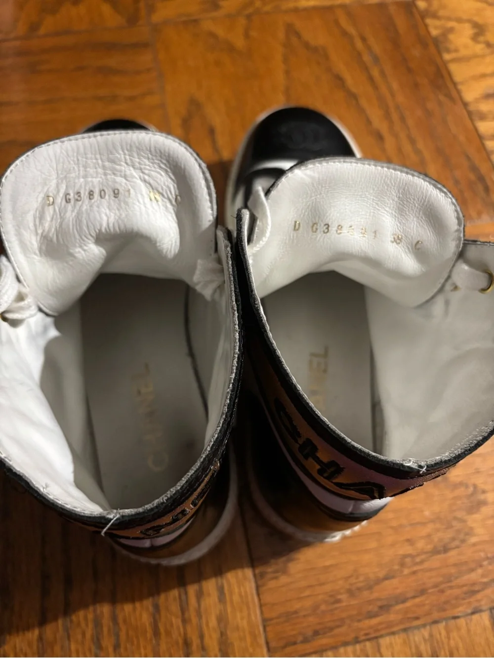 CHANEL White and Black Logo High-Top Sneakers